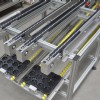 Over under pallet conveyors with roller return